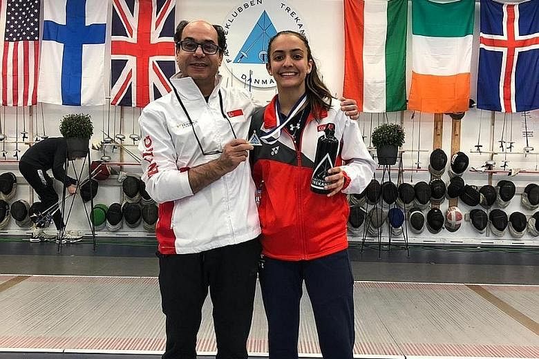 Fencer Amita Berthier was training in Kentucky with coach Amgad Khazbak before her plans were derailed by Covid-19