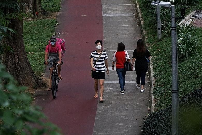 The Land Transport Authority said yesterday it will roll out a campaign to encourage gracious behaviour on shared paths and footpaths by the end of this year. ST PHOTO: KHALID BABA