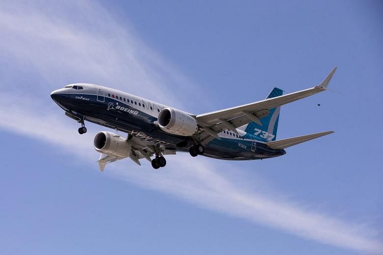 A Boeing 737 Max coming in to land after a test flight at the plane manufacturer's facility in Seattle, Washington, in June. The US aviation authority is seeking public comment on its proposed fixes to the grounded plane before it can start commercia