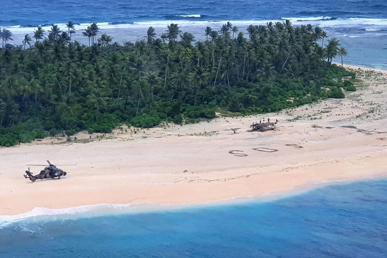 Three Micronesian sailors stranded on a remote Pacific island drew a giant SOS message in the sand to attract the attention of rescuers, who found them three days after they went missing at sea. Australian and United States aircraft located the men o