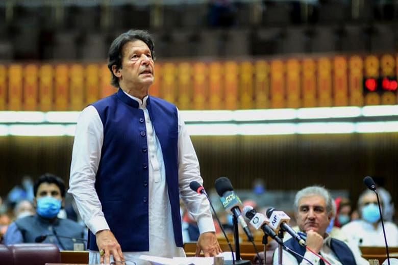Mr Imran Khan speaking during the National Assembly session in Islamabad on June 25. Yesterday, he led a rally through Muzaffarabad, the capital of Pakistan-administered Kashmir.