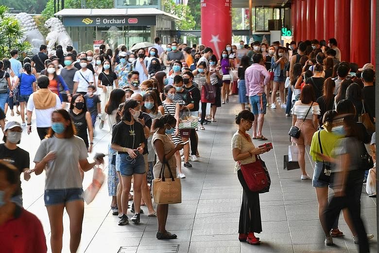 The Orchard shopping belt was packed yesterday. One shopper said it looked like Singaporeans "do not agree" that the country is in a recession going by the number of people out and about in Orchard Road.