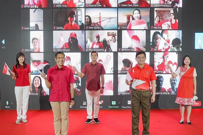The five MPs for East Coast GRC(from left), Ms Jessica Tan, Dr Maliki Osman, Mr Tan Kiat How, Deputy Prime Minister Heng Swee Keat and Ms Cheryl Chan, during the National Day virtual observance ceremony in Bedok Community Centre yesterday. The sessio