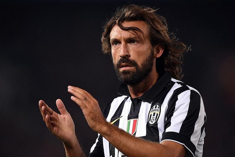 Andrea Pirlo playing for Juventus in 2014. He has signed a two-year deal as head coach and replaces the sacked Maurizio Sarri.