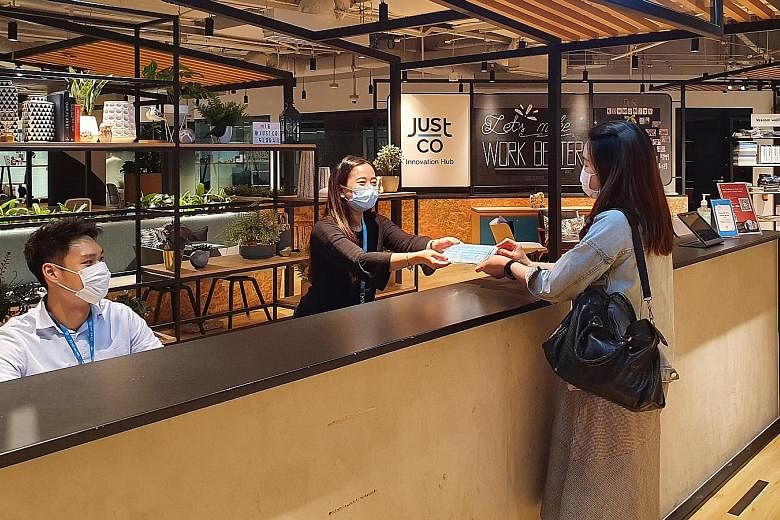 The JustCo co-working space at Marina Square. The local operator, which has 17 co-working spaces here, is opening two new centres - at OCBC Centre East and The Centrepoint this month and in October, respectively. The launch was delayed due to the pan