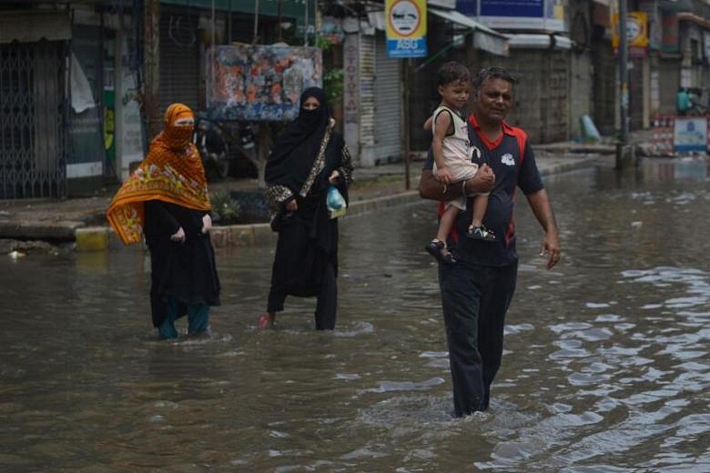 Monsoon floods expose blockages in Karachi's drains - and politics ...