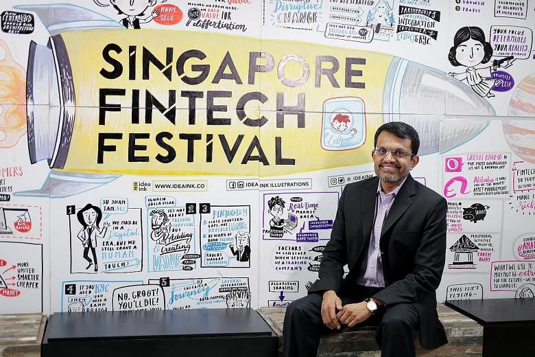 MAS managing director Ravi Menon, pictured here at the Singapore FinTech Festival in 2017, said at a webinar yesterday that while the trade conflict between the US and China is worrying, he is more concerned about the conflicts over technology. ST FI