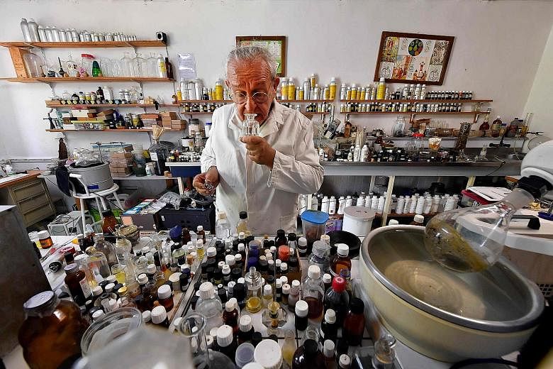 Mr Michael Moisseeff at his laboratory in his home in Montegut-Lauragais near Toulouse, south-western France.
