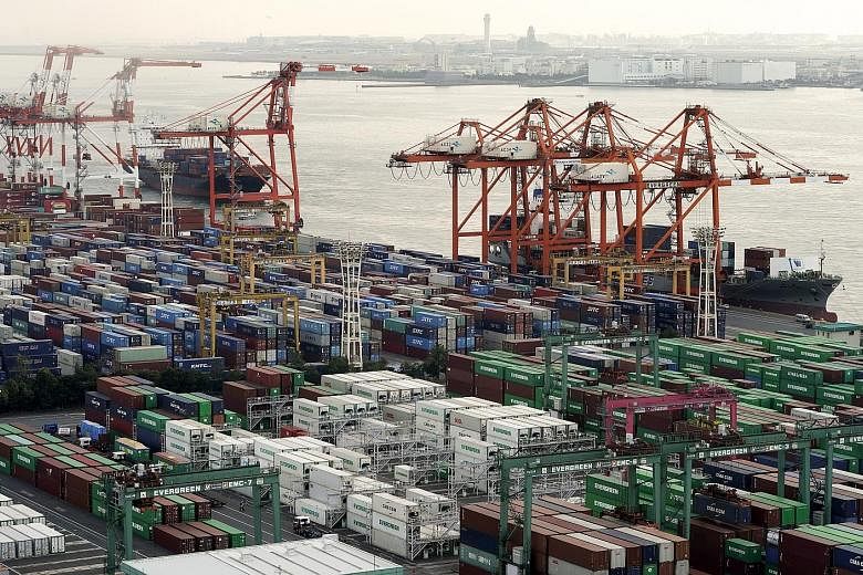 The Aomi international cargo terminal in Tokyo. Japan's exports extended their double-digit slump into a fifth month last month, dashing hopes for a trade-led recovery from the deep recession. PHOTO: EPA-EFE