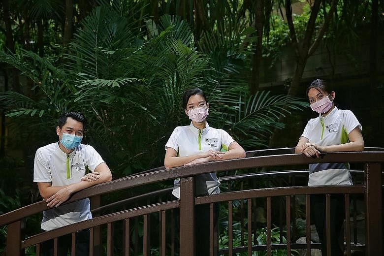 Former SIA cabin crew members (from left) Tristan Yap, Regina Yeoh and Sandra Goh found meaning in their work as temporary care ambassadors and decided to quit their airline jobs to become patient care officers at Khoo Teck Puat Hospital. Mr Yap said