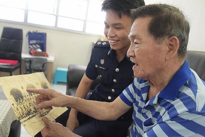 Scholarship recipient Jared Koh was inspired to join the police force by his grandfather, Mr Tan Hang Meng, who was a former policeman. Mr Koh grew up listening to his grandfather's police yarns. ST PHOTO: ALPHONSUS CHERN