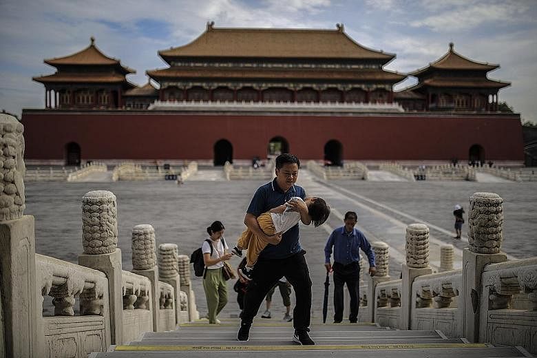 Visitors to the Forbidden City in Beijing on Wednesday seen without masks outdoors. China has reported no new locally transmitted cases on the mainland for five days after successfully controlling flare-ups in Beijing, the Xinjiang region and elsewhe