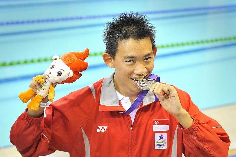 A proud day for Rainer Ng on Aug 18, 2010 after winning Singapore's first silver medal at the home Youth Olympic Games in the 50m backstroke.