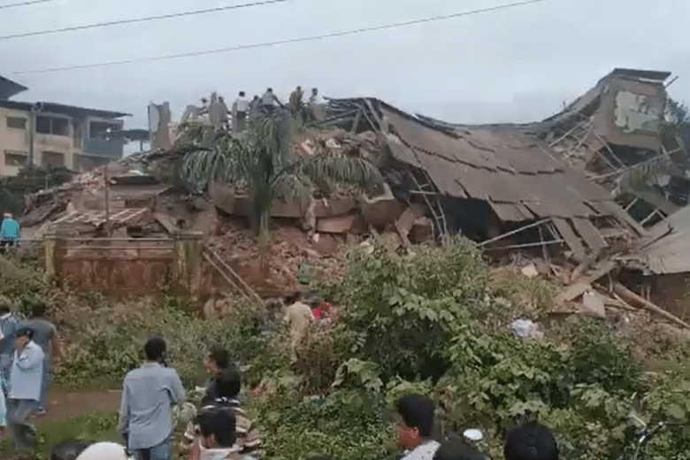 One dead, scores feared trapped in India building collapse | The ...