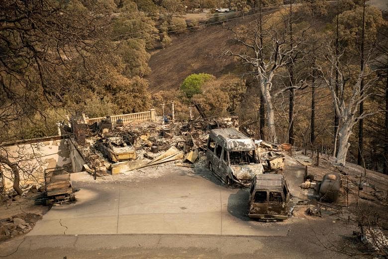 The remains of a house in Vacaville on Monday, when evacuees began returning to the area, after a gigantic blaze called the LNU Lightning Complex wildfire torched homes and vineyards. PHOTO: AGENCE FRANCE-PRESSE