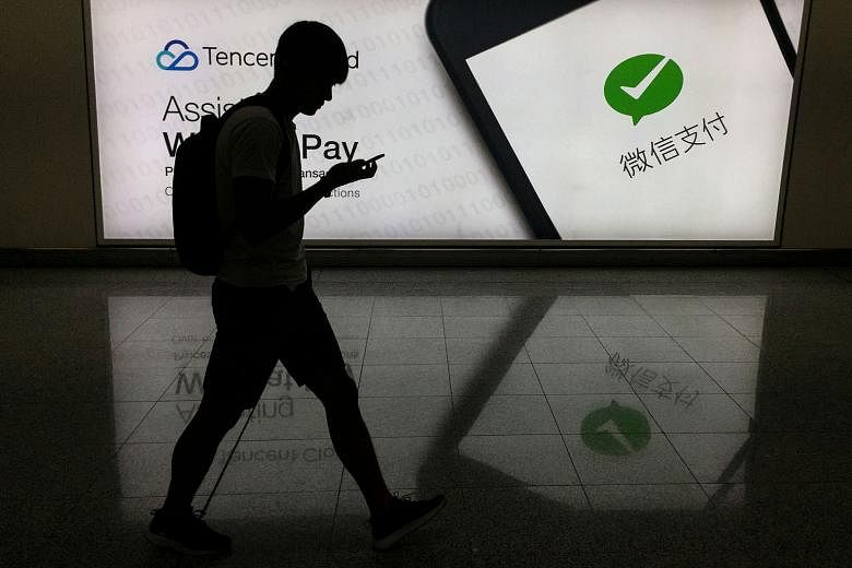 Last Friday, a group of WeChat users in the US launched a legal challenge against a similar executive order, saying it would bar access in the country to the Chinese messaging app. WeChat is owned by Chinese Internet giant Tencent. PHOTO: AGENCE FRAN