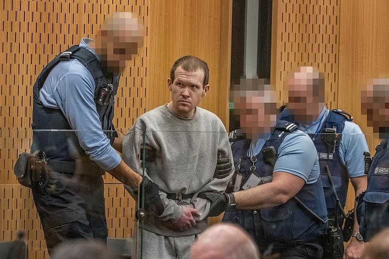 Gunman Brenton Tarrant being taken to a High Court hearing in Christchurch, New Zealand on Tuesday. He will be sentenced this week.