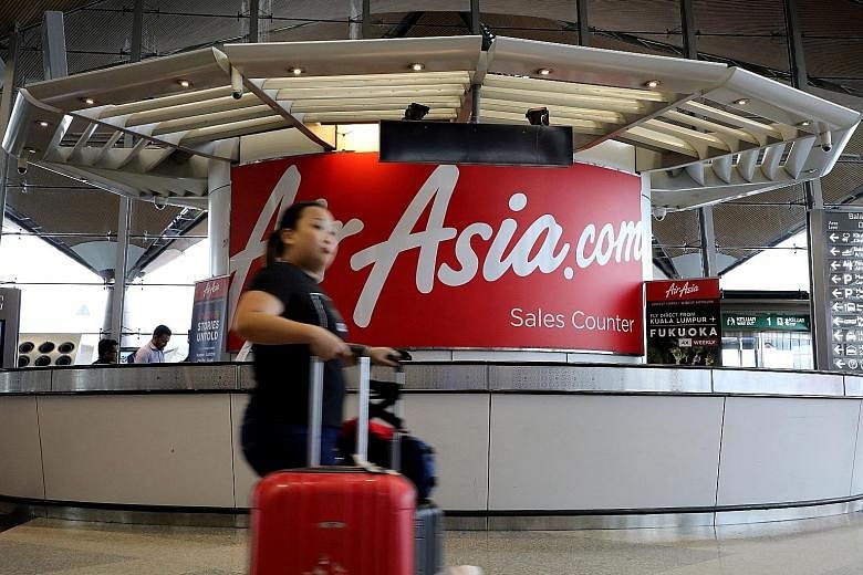 Malaysia-based AirAsia resumed flights in the domestic market in late April after suspending them for a month during the coronavirus outbreak. Travel bubbles are also bringing some signs of recovery to regional aviation. PHOTO: REUTERS