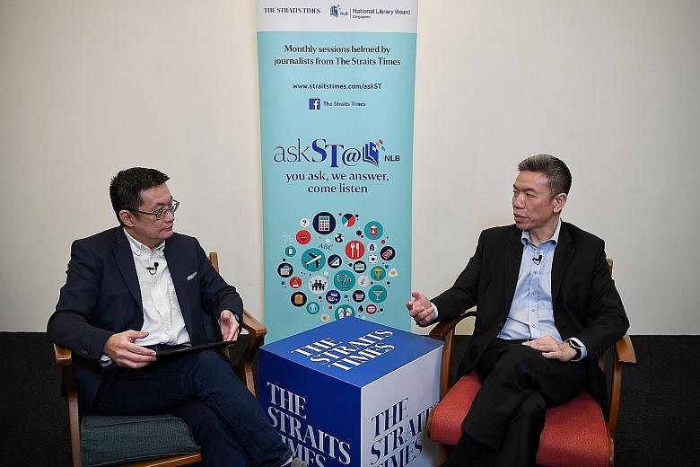 The Straits Times' Invest editor Tan Ooi Boon (left) and Mr Alfred Chia, chief executive of financial advisory firm SingCapital, at the askST@NLB virtual session on managing one's money during the pandemic, aired on The Straits Times Facebook page on