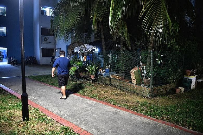 Ms Liang Xueqiu was found injured and lying motionless at Block 211 Boon Lay Place on Thursday, and was pronounced dead in hospital. Her husband, Chinese national Cui Huan, is accused of killing her at a footpath at the block. ST PHOTO: ARIFFIN JAMAR
