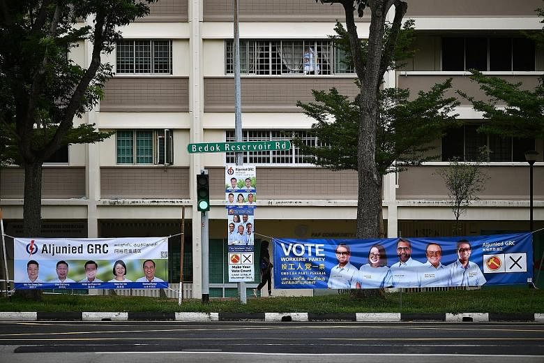 Election campaign banners and posters for the People's Action Party and Workers' Party teams contesting in Aljunied GRC during the general election. The Elections Department said it received more than 220 complaints and pieces of feedback during the 