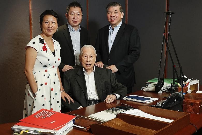 Mr Teo Woon Tiong pictured in 2018 with the second-generation business leaders of Pacific International Lines: (from left) executive director of corporate development Lisa Teo, executive director of the fleet division Teo Choo Wee and executive chair