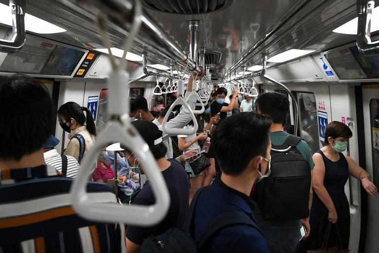 Education Minister Lawrence Wong stressed the need to have "a good part of workers" travelling after 9.30am to reduce the risk of large crowds gathering in public transport, in public spaces and in office buildings.