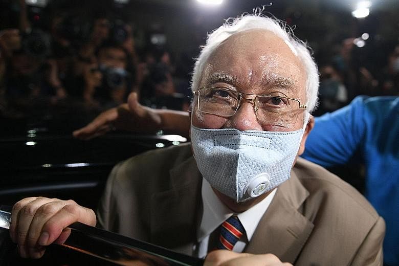 Former Malaysian premier Najib Razak leaving the Duta Court complex in Kuala Lumpur on July 28 after he was found guilty of seven counts of corruption over the millions deposited into his bank accounts.