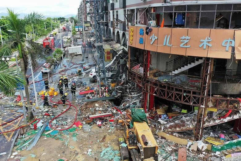 The gas explosion took place at about 9am in a crowded neighbourhood in Zhuhai city, Guangdong province. Three people were injured. PHOTO: AGENCE FRANCE-PRESSE