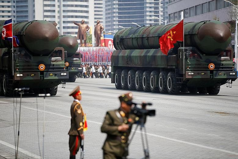 Intercontinental ballistic missiles on parade in Pyongyang in 2017. North Korea was singled out as an imminent threat by outgoing Japanese Prime Minister Shinzo Abe, who called for Japan's acquisition of first-strike capability on enemy missile bases