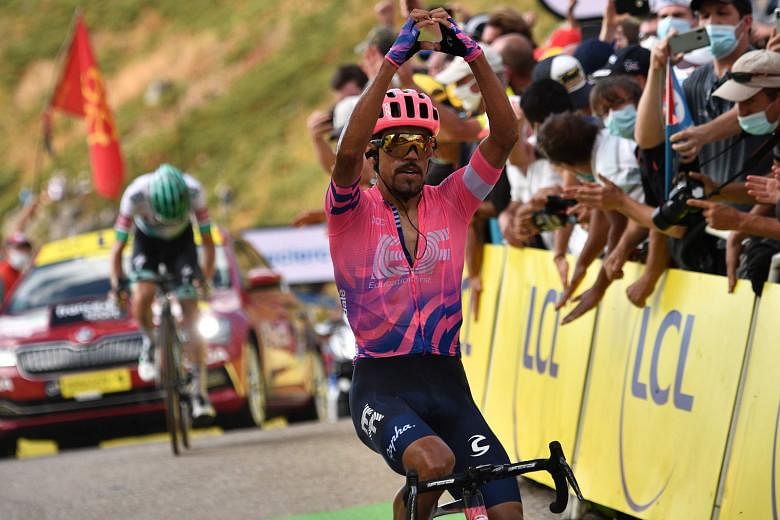 Dani Martinez winning a Tour de France stage for the first time after an intense 13th stage that ended at Puy de Mary.