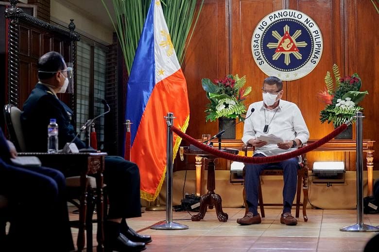 Philippine President Rodrigo Duterte (far right) speaking to Chinese Defence Minister Wei Fenghe in Manila on Friday. General Wei's South-east Asian tour coincides with rhetorical sparring between the United States and China over the South China Sea.