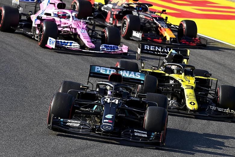 Lewis Hamilton leading the pack at the Tuscan Grand Prix. The Mercedes driver overcame a stop-start race, amid two red flags, for a sixth win this year as he extended his lead in the drivers' standings to 55 points. PHOTO: EPA-EFE