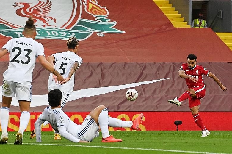 Mohamed Salah rifling in his second goal to put Liverpool 3-2 up. Leeds pegged back the Reds each time they led and it took the Egyptian's second penalty to give them full points. PHOTO: REUTERS