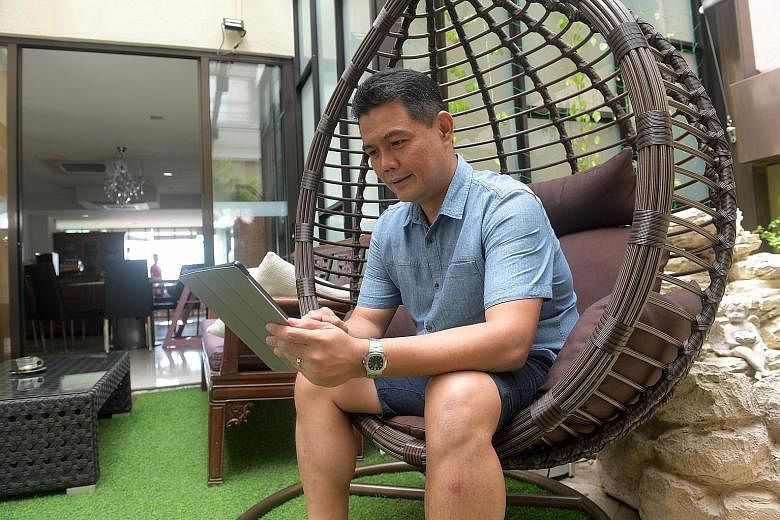 Mr Francis Tan said The Straits Times News Tablet gives him the convenience of accessing news on the go, together with the familiar curation of a print layout. The 48-year-old has not gone a single day without reading the paper, which celebrates its 