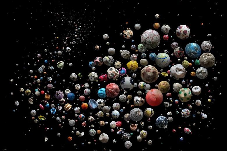 British photographer Mandy Barker's work features 633 soccer balls collected from 23 countries and islands in Europe, found on 104 beaches by 62 members of the public in just four months. A display showing the plastic rubbish collected on Singapore's