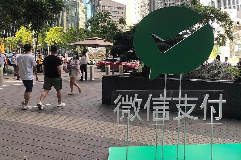 A WeChat Pay sign in Guangdong province last month. Tencent, which operates WeChat, is eyeing further expansion into South-east Asia. PHOTO: REUTERS
