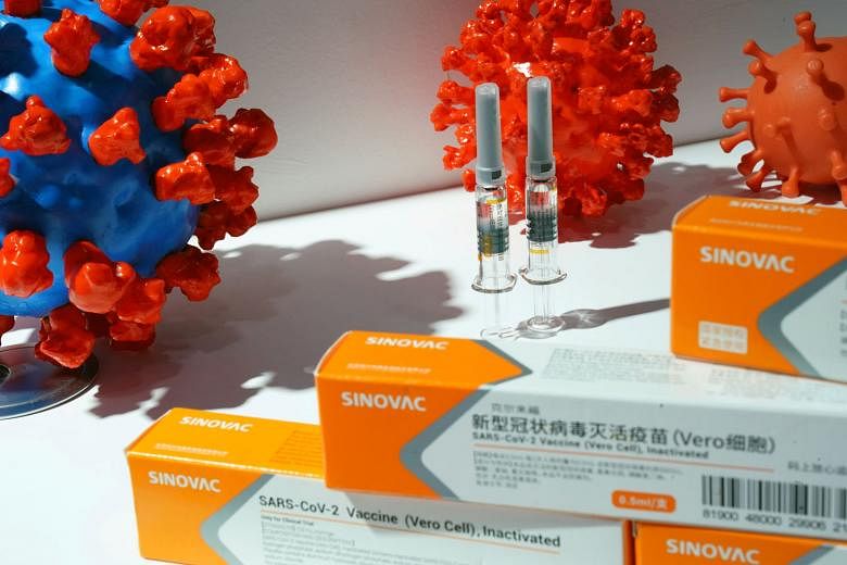 A booth displaying a coronavirus vaccine candidate from Sinovac Biotech at the 2020 China International Fair for Trade in Services, in Beijing on Sept 4. PHOTO: REUTERS