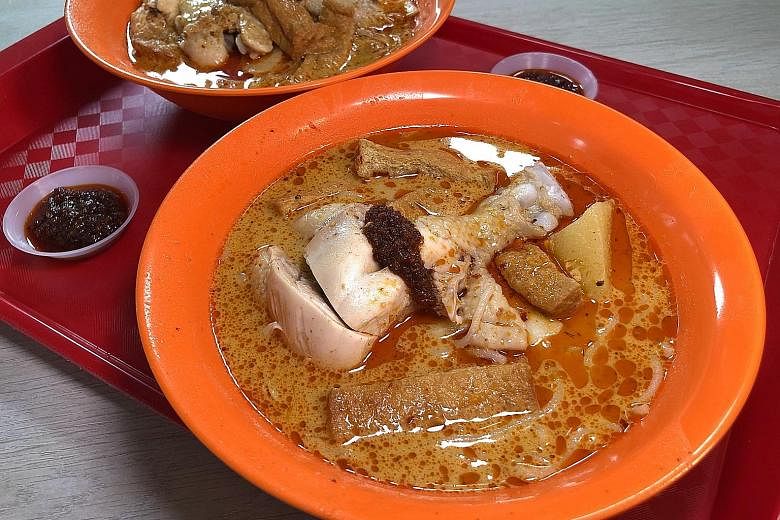 Curry chicken drumstick laksa noodles (above, foreground) and curry chicken wing beehoon and yellow noodles (above, background). (From top) Traditional ngoh hiang, premium coffee pork ribs, braised chicken with chestnut and Gingko Yam Paste.