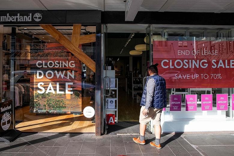 A shop in Auckland - New Zealand's largest city - having its closing-down sale in June, as a strict, seven-week nationwide lockdown to combat the coronavirus that ended in May brought the country to a standstill and led the South Pacific nation to su