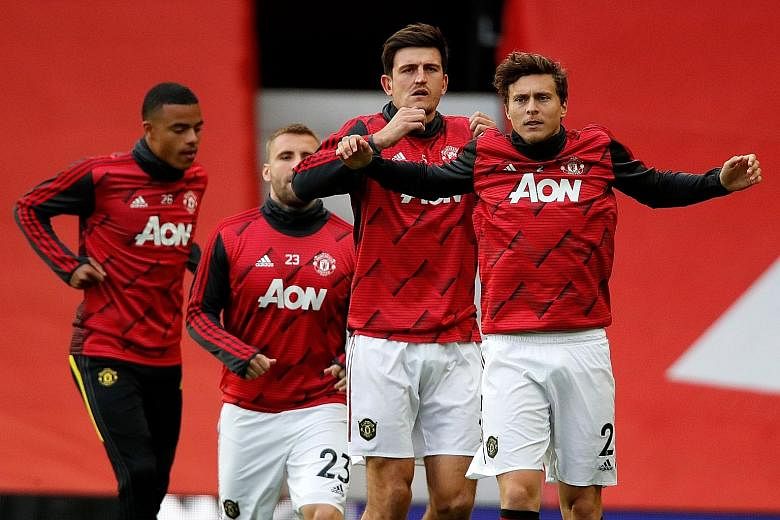 Man United manager Ole Gunnar Solskjaer has kept faith with Harry Maguire (third from left) as club captain, despite the defender being given a 21-month suspended jail sentence for a brawl on holiday in Greece. PHOTO: AGENCE FRANCE-PRESSE