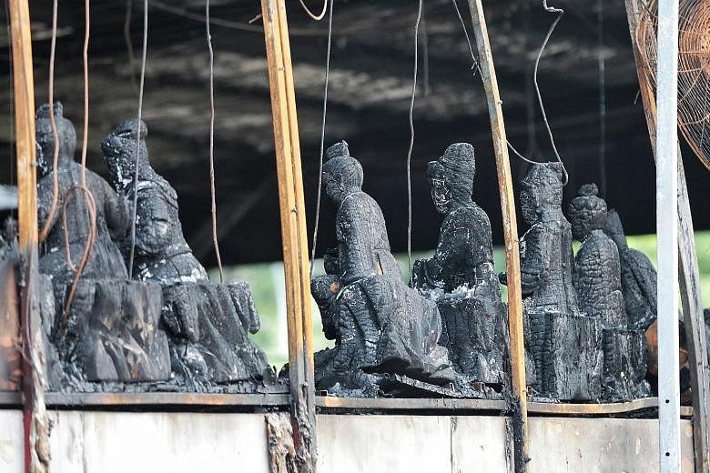 The blaze at the Sembawang God of Wealth Temple, which took three hours for 62 firefighters to put out, claimed the lives of three dogs. The animals were among seven stray dogs that were cared for by the temple whose 9.44m-tall statue of the God of W