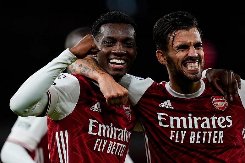 Arsenal striker Eddie Nketiah, with Dani Ceballos, performing the role of a super-sub to perfection by poaching the winner against West Ham. PHOTO: AGENCE FRANCE-PRESSE