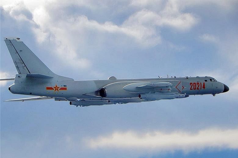 China's air force on Saturday put out a video showing exercises by its nuclear-capable H-6 bombers (above), which have been involved in many Chinese fly-bys of Taiwan.