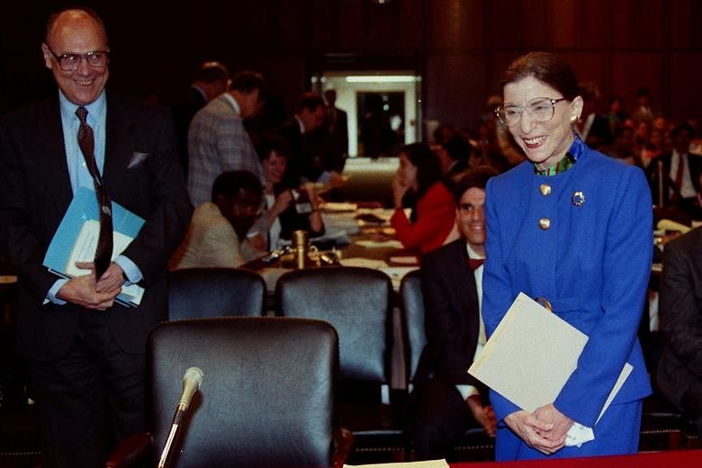A July 20, 1993, file photo of then Supreme Court nominee judge Ruth Bader Ginsburg and her husband Martin at her confirmation hearing before the Senate Judiciary Committee on Capitol Hill in Washington.