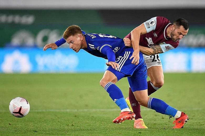 Leicester City midfielder Harvey Barnes gets into a tussle with Burnley's Phil Bardsley as the Foxes claim a 4-2 win at home.