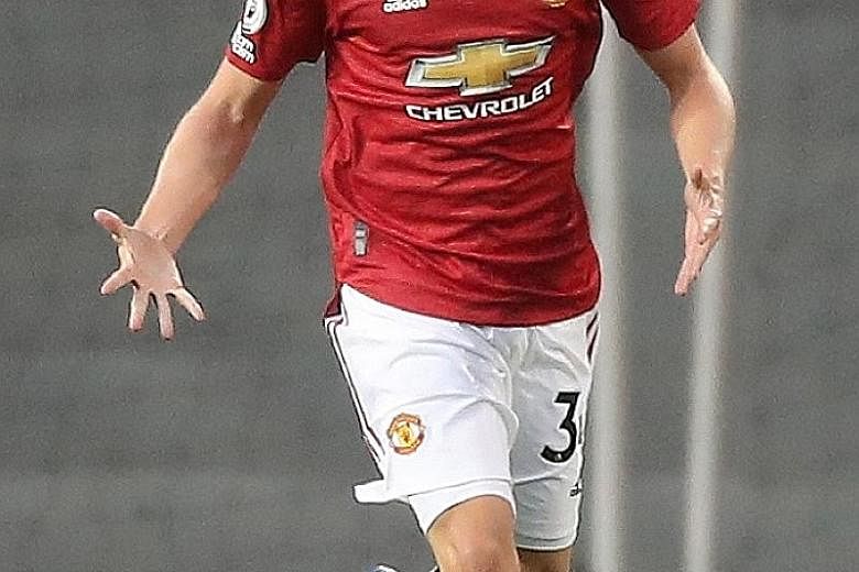 Donny van de Beek, who scored on his debut in the 3-1 loss to Crystal Palace, is Manchester United's only close-season signing so far. PHOTO: EPA-EFE