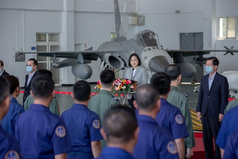 Taiwan's President Tsai Ing-wen speaking to the island's air force pilots and engineers during her visit to Makung Air Force Base on Penghu yesterday. The base, home to F-CK-1 Ching-kuo Indigenous Defence Fighters which first entered service in 1997,