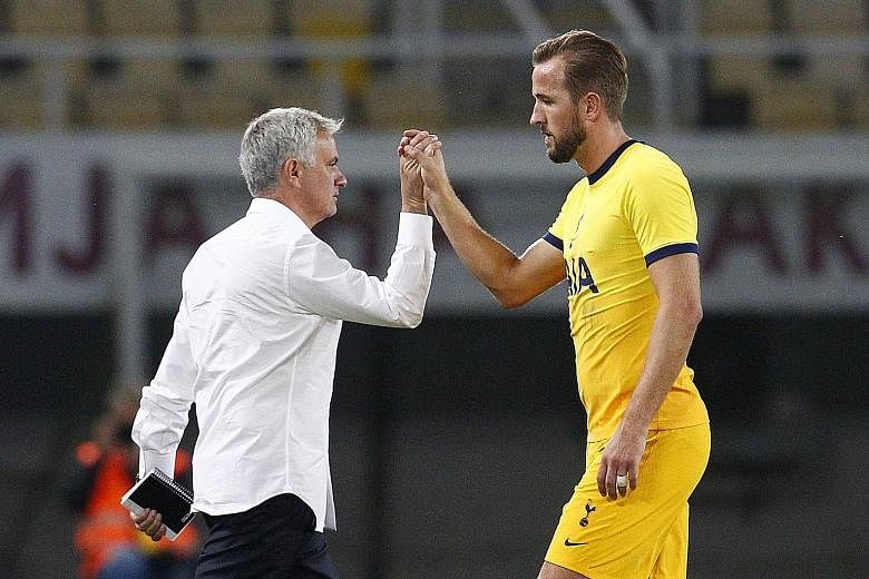 Manager Jose Mourinho with striker Harry Kane after Spurs' 3-1 away win over Shkendija in the Europa League third qualifying round.