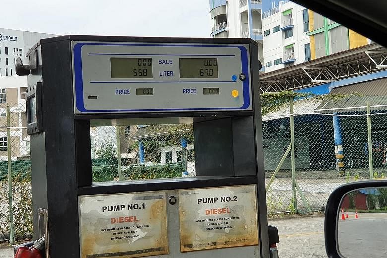 A pump site in Sin Ming Drive (above) selling unbranded diesel from so-called "white pumps" (below). According to Urban Redevelopment Authority guidelines, only certain industries are allowed to set up their own diesel pumps. The fuel must be for the